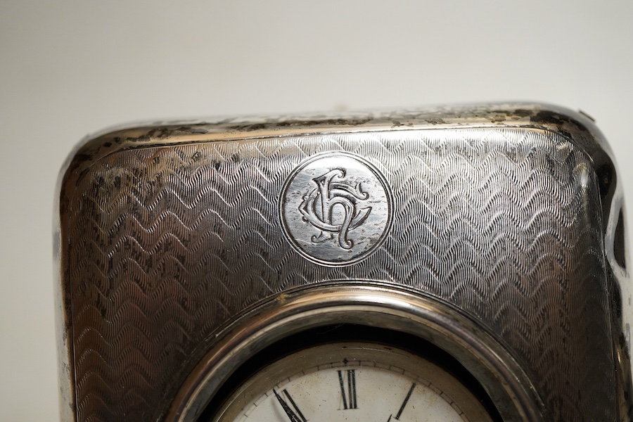 An Edwardian silver perpetual desk calendar, Birmingham, 1907, E F Braham, initalled, (mechanism a/f) together with an engine turned propelling pencil and a Swiss open faced poclet watch contained within a silver faced l